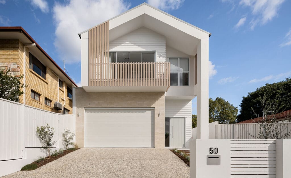 A wide, modern Gliderol sectional door, with troubleshooting advice for issues like panel alignment, gaps, and worn hinges. - Gliderol
