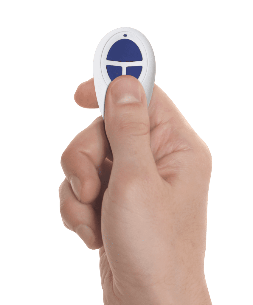 Reprogramming a Gliderol remote control by pressing the illuminated buttons to sync it with the opener. - Gliderol